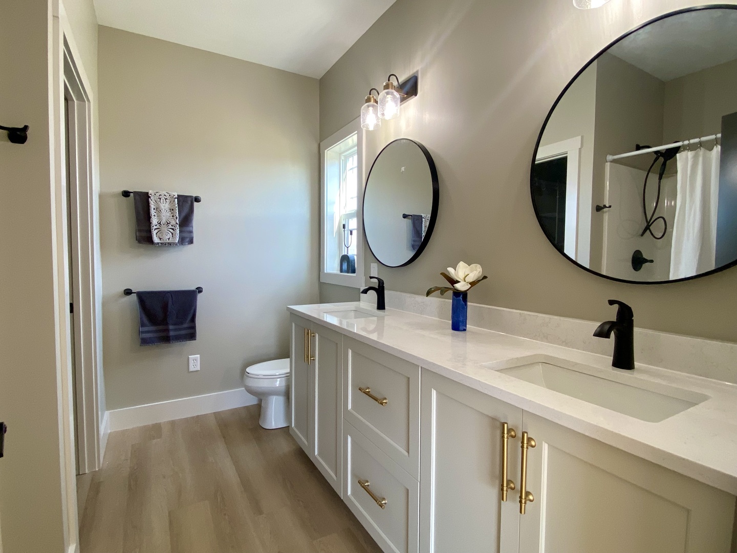1619 Peppermill Lane Champaign, IL 61822 - Photo 24 of 31 a bathroom with a toilet a sink and a mirror