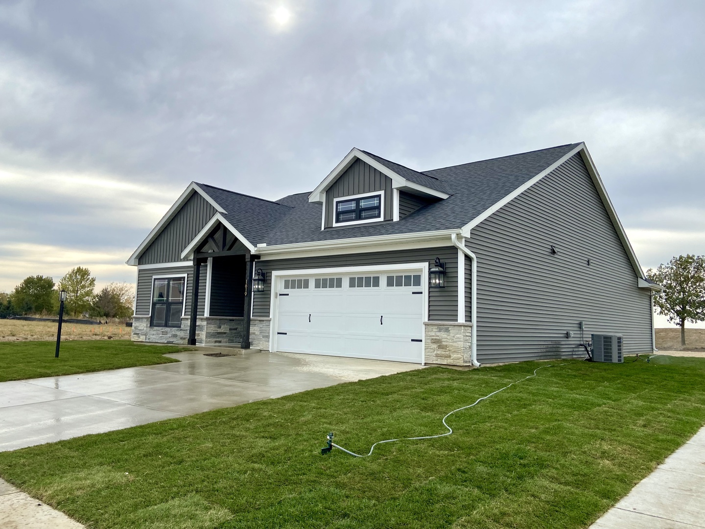 1619 Peppermill Lane Champaign, IL 61822 - Photo 30 of 31 a front view of house with yard and green space