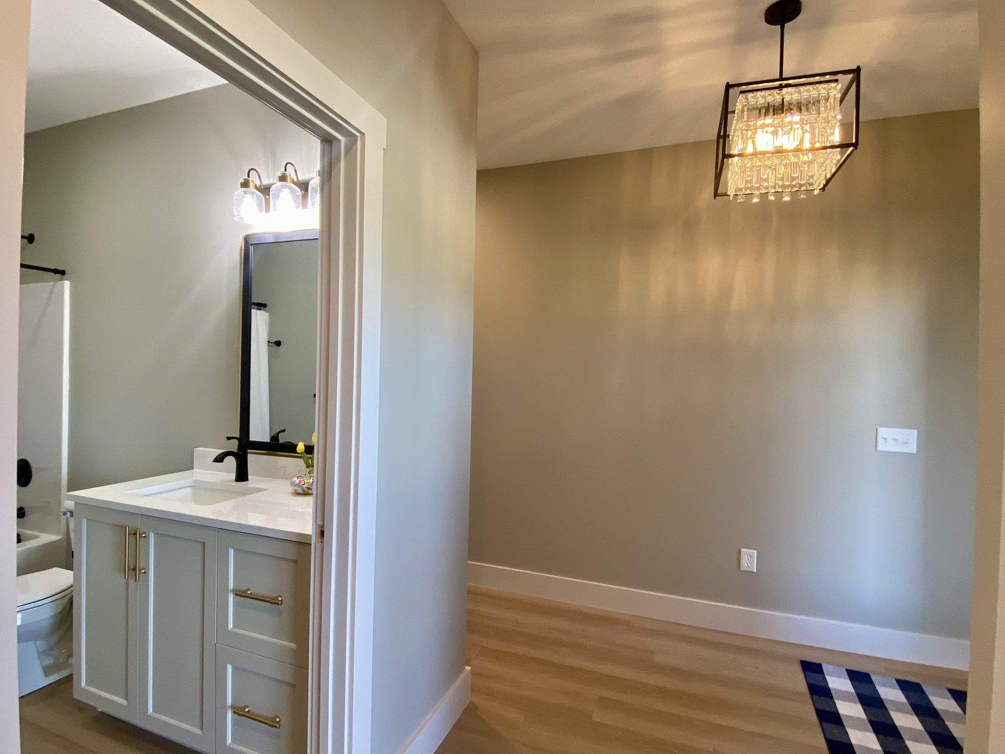 1619 Peppermill Lane Champaign, IL 61822 - Photo 6 of 31 a bathroom with a sink and a mirror