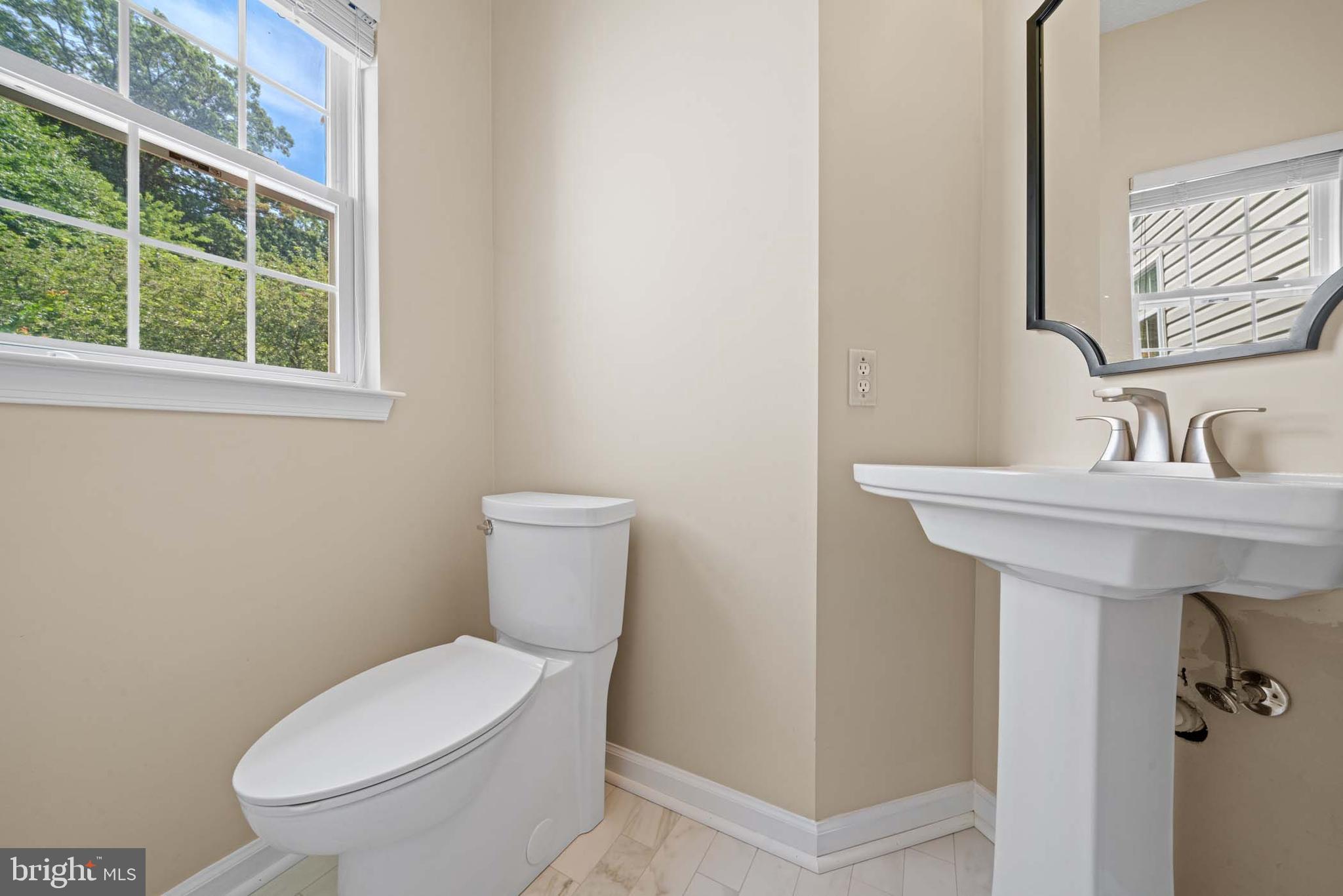 6442 Spring Forest Road Frederick, MD 21701 - Photo 22 of 69 Main level half bath