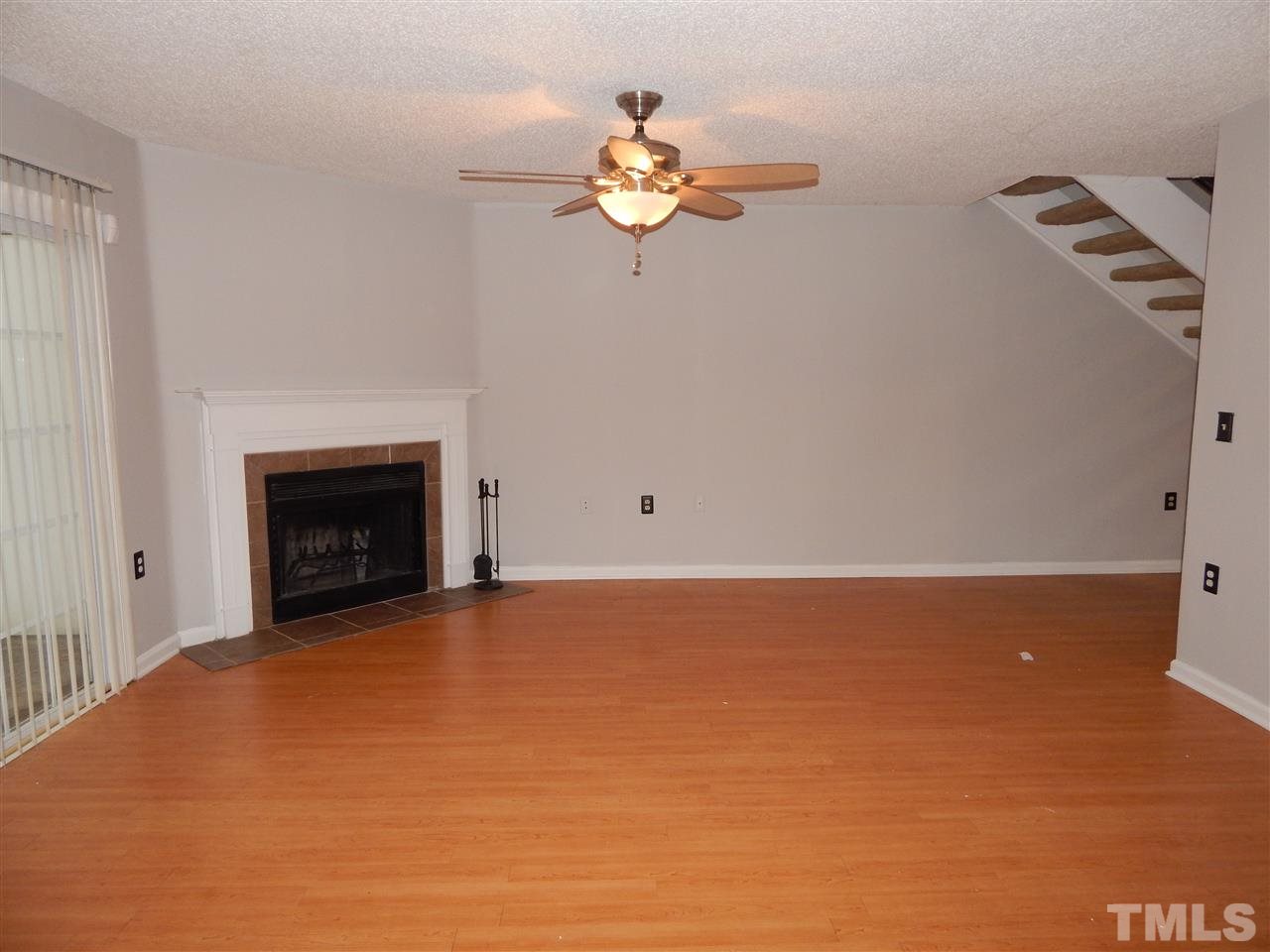 7707 Falcon Rest Circle, Unit 7707 Raleigh, NC 27615 - Photo 6 of 19 a view of a fireplace with window