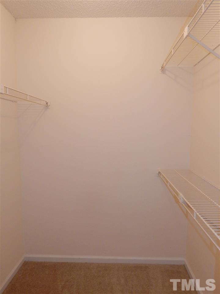 7707 Falcon Rest Circle, Unit 7707 Raleigh, NC 27615 - Photo 10 of 19 a view of small space with empty racks