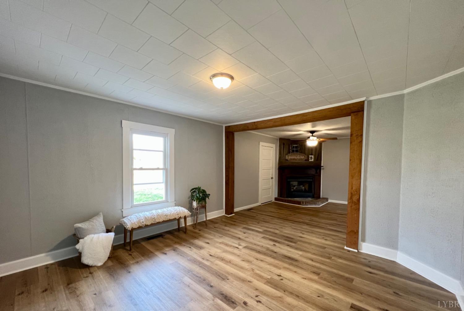 295 Little Cub Road Appomattox, VA 24522 - Photo 3 of 89 a view of a livingroom with wooden floor and a window