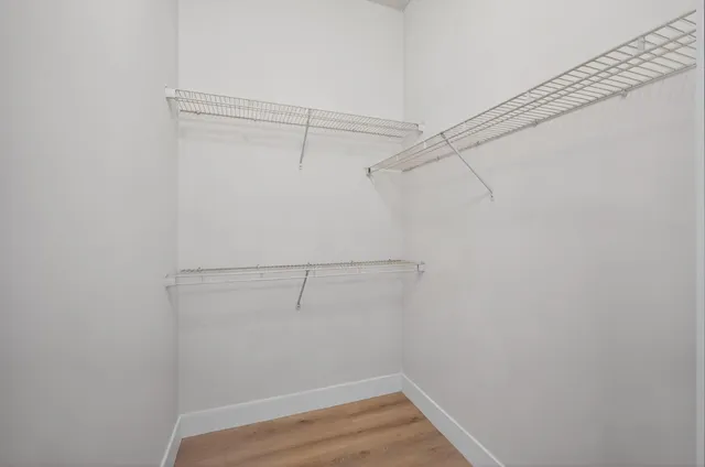 a utility room with sink dryer and washer