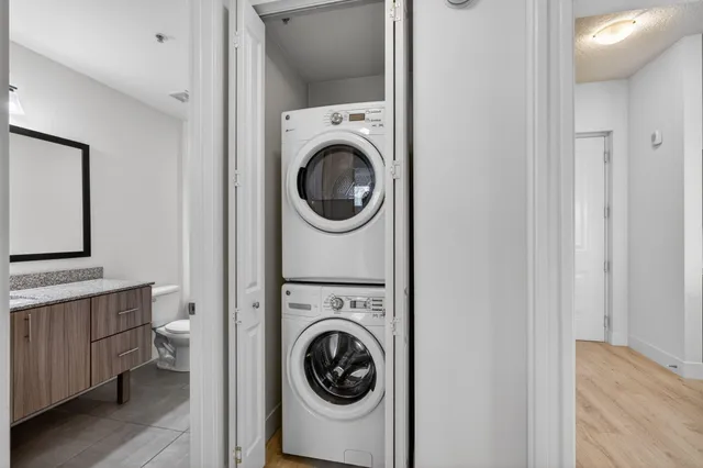a view of a balcony with wooden fence