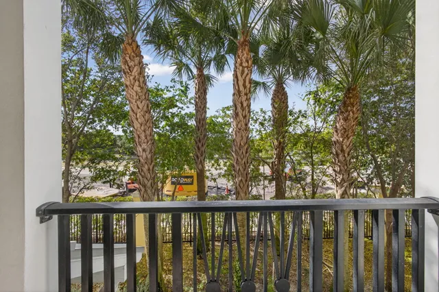 an aerial view of residential houses with outdoor space and swimming pool