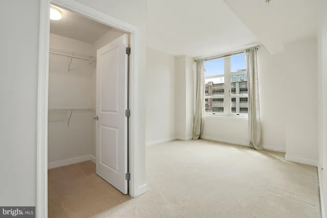 a bathroom with a shower and toilet