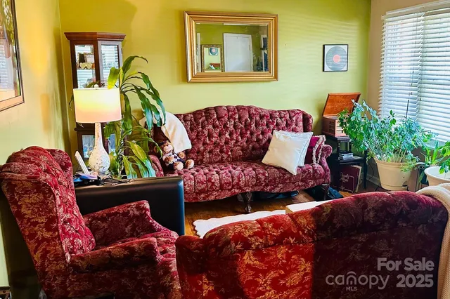 a living room with furniture and a couch