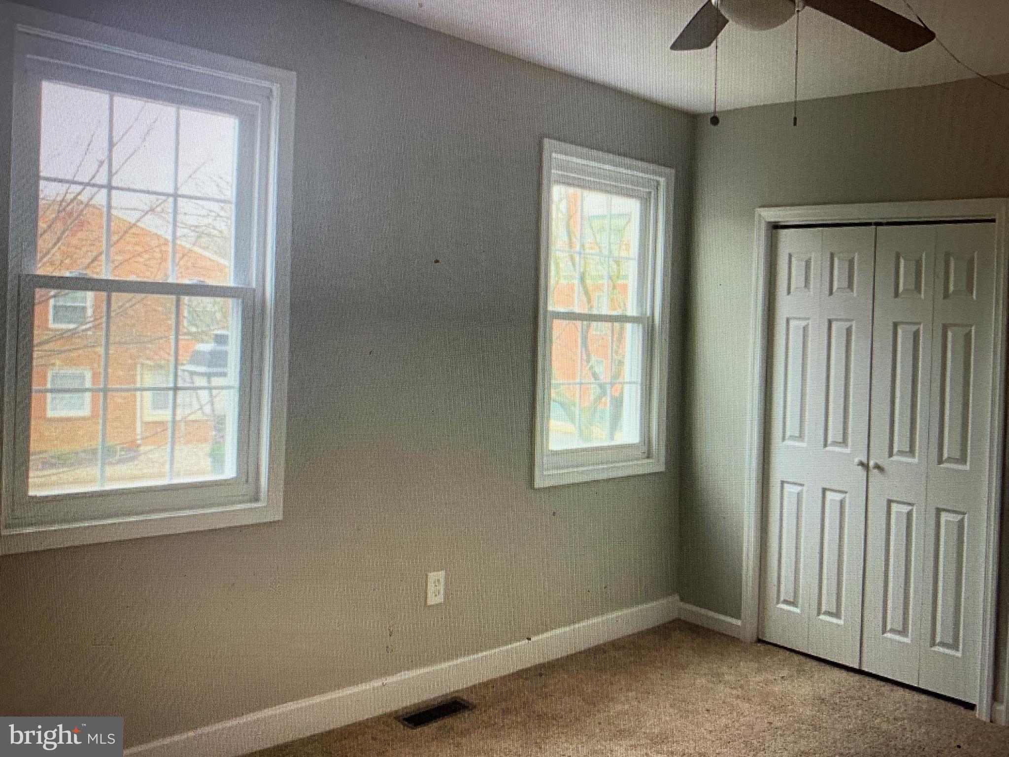 406 High Street, Unit 2 Burlington, NJ 08016 - Photo 9 of 11 an empty room with a window