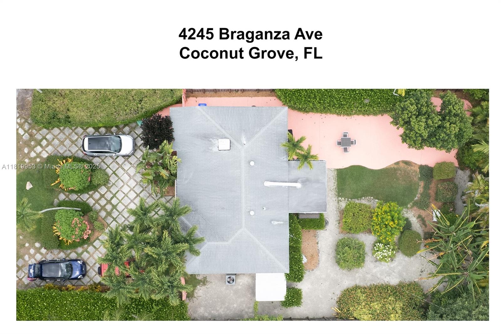4245 Braganza Avenue Miami, FL 33133 - Photo 4 of 4 an aerial view of a house with a yard