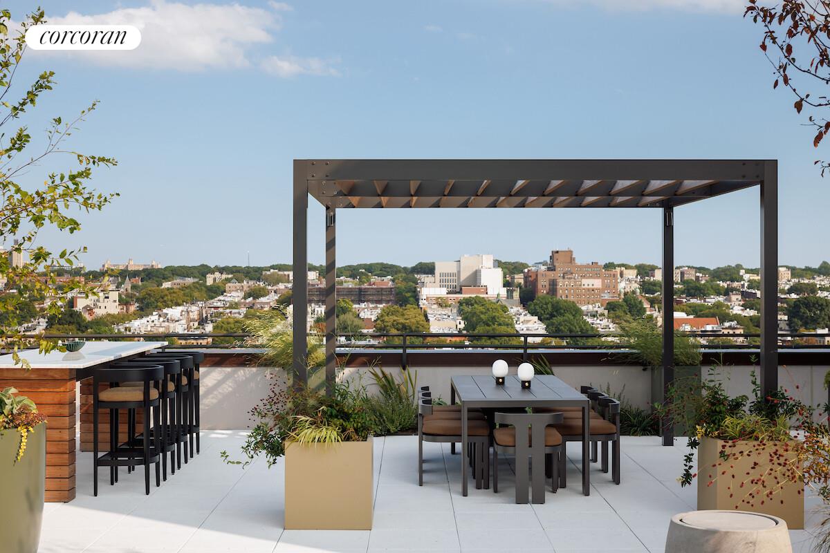 380 4th Avenue, Unit 11I Brooklyn, NY 11215 - Photo 25 of 30 a view of a chairs and table in patio