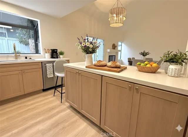 a kitchen with a sink cabinets and counter space