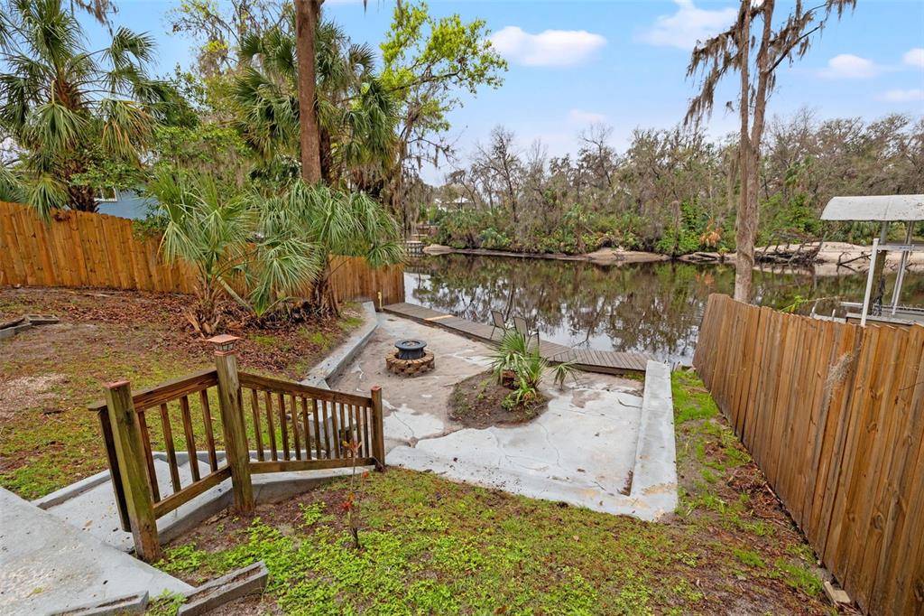 3908 Alafia Boulevard Brandon, FL 33511 - Photo 11 of 42 a view of a wooden deck with a bench