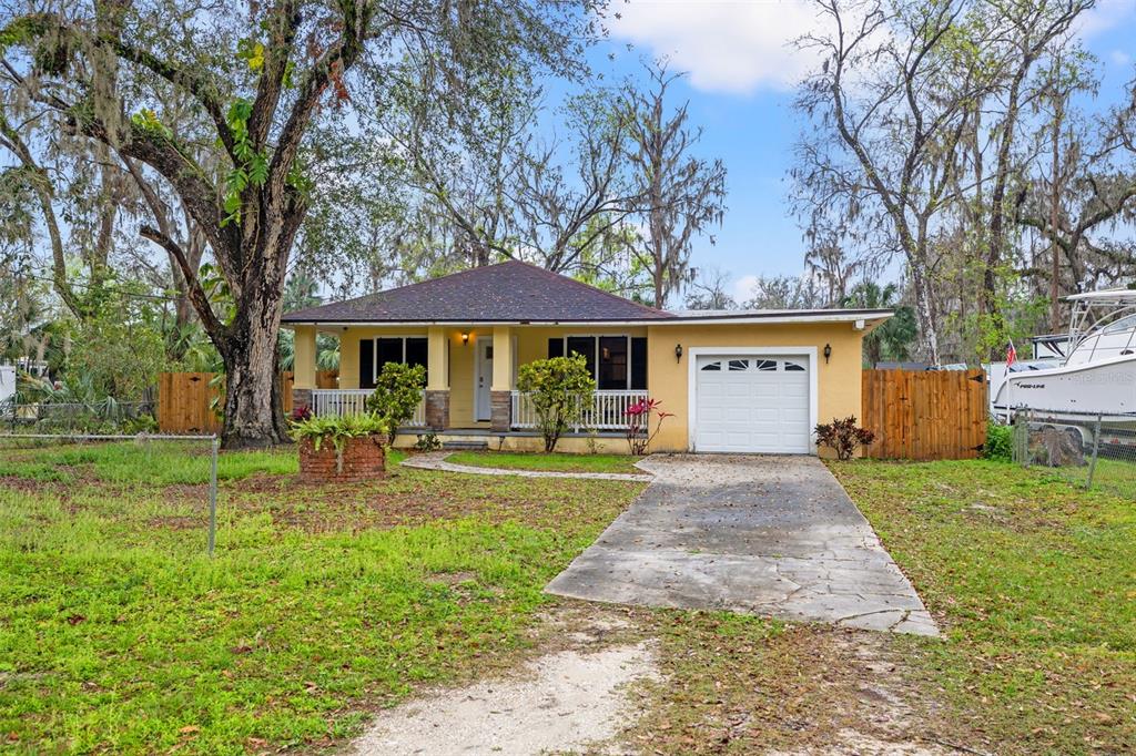 3908 Alafia Boulevard Brandon, FL 33511 - Photo 3 of 42 a front view of a house with garden