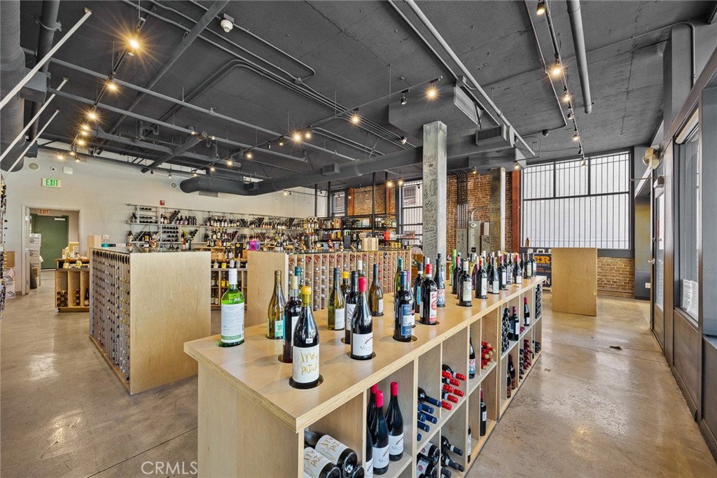 155 North Raymond Avenue Pasadena, CA 91103 - Photo 17 of 56 a room with lots of wooden furniture