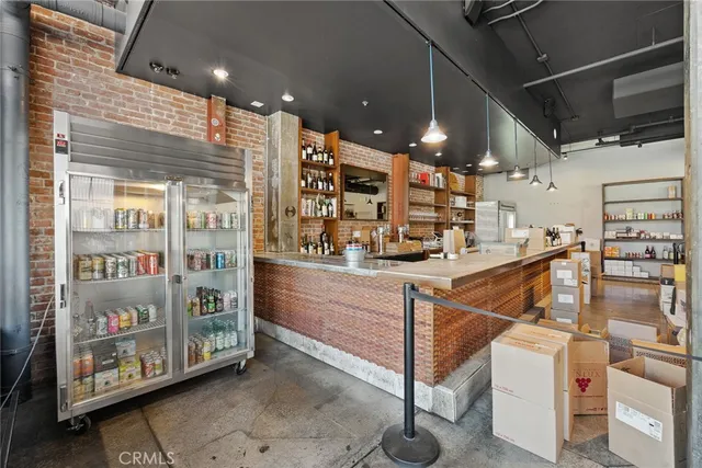 a view of parking garage with cars