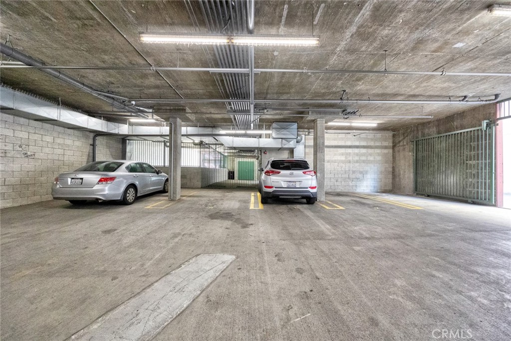 155 North Raymond Avenue Pasadena, CA 91103 - Photo 21 of 56 a view of parking space with parked cars