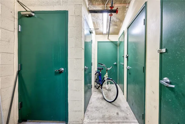 a view of a kitchen with a sink and a fireplace