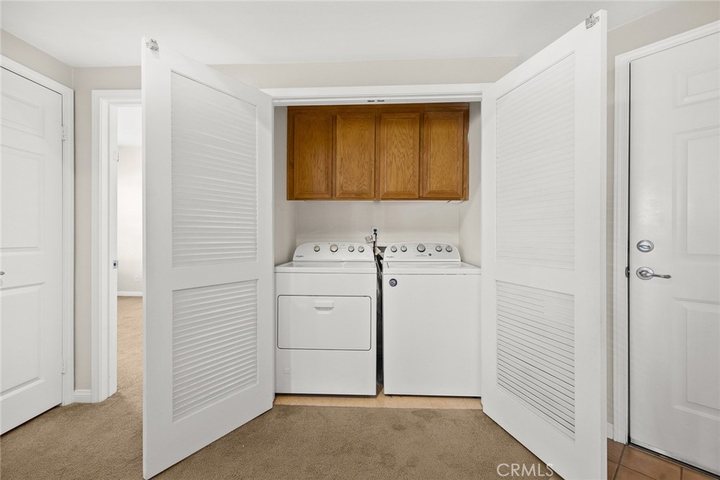 155 North Raymond Avenue Pasadena, CA 91103 - Photo 35 of 56 a utility room with dryer and washer