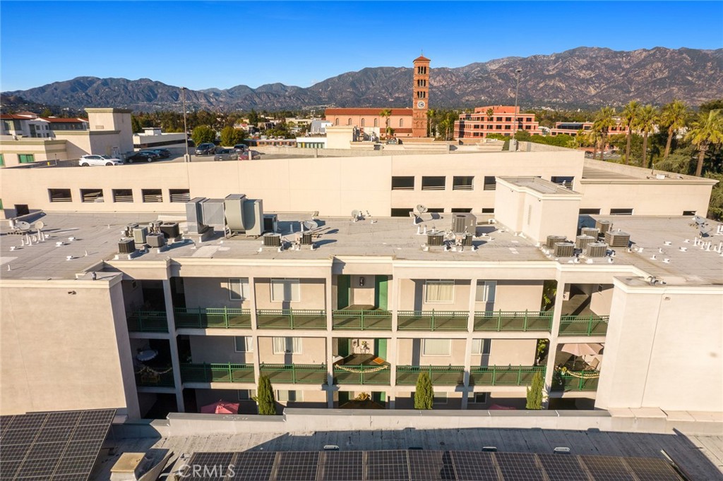 155 North Raymond Avenue Pasadena, CA 91103 - Photo 4 of 56 a view of a large building with a terrace view