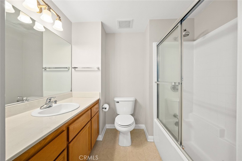 155 North Raymond Avenue Pasadena, CA 91103 - Photo 41 of 56 a bathroom with a sink a toilet and shower