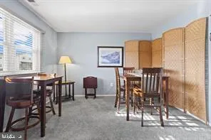 a view of a livingroom with furniture