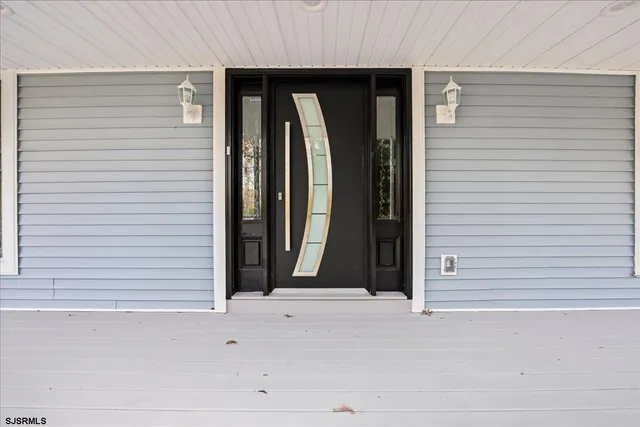 a kitchen with stainless steel appliances granite countertop a refrigerator stove and microwave