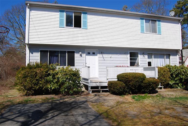 10 Red Brook Road, Unit A & B East Wareham, MA 02538 - Photo 1 of 15 a view of a house with a yard and plants