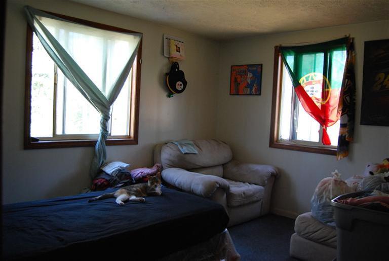 10 Red Brook Road, Unit A & B East Wareham, MA 02538 - Photo 11 of 15 a living room with furniture and a window