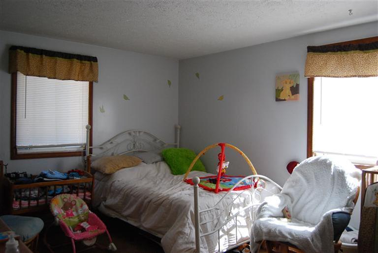 10 Red Brook Road, Unit A & B East Wareham, MA 02538 - Photo 12 of 15 a bedroom with two beds and a window