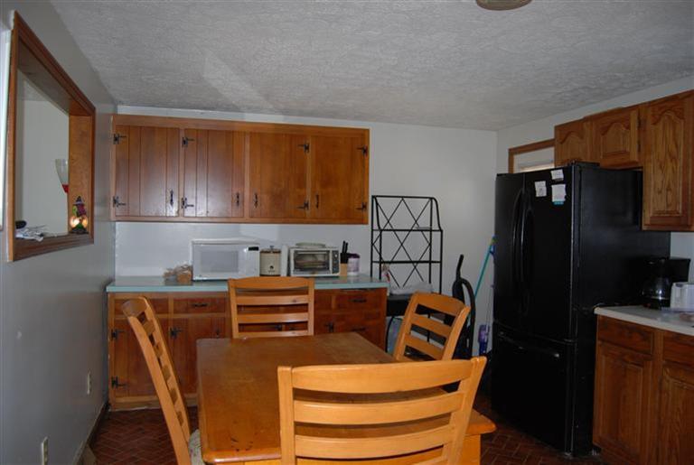 10 Red Brook Road, Unit A & B East Wareham, MA 02538 - Photo 4 of 15 a kitchen with stainless steel appliances granite countertop a refrigerator and a stove top oven