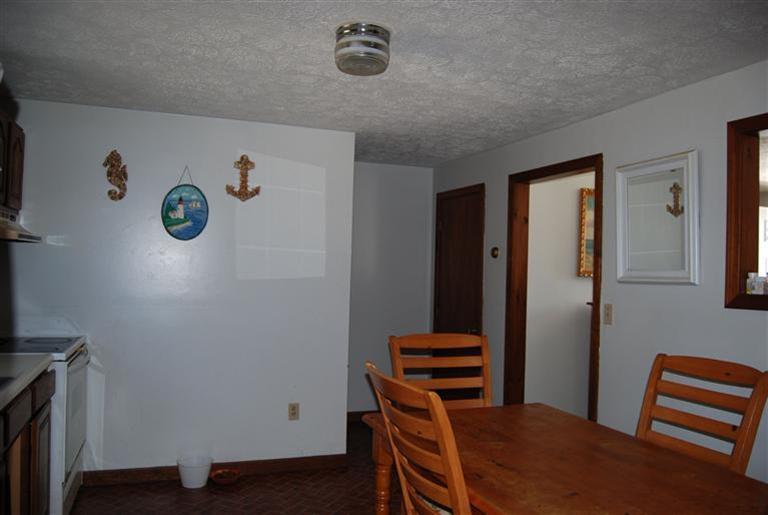 10 Red Brook Road, Unit A & B East Wareham, MA 02538 - Photo 5 of 15 a view of room with workspace and windows