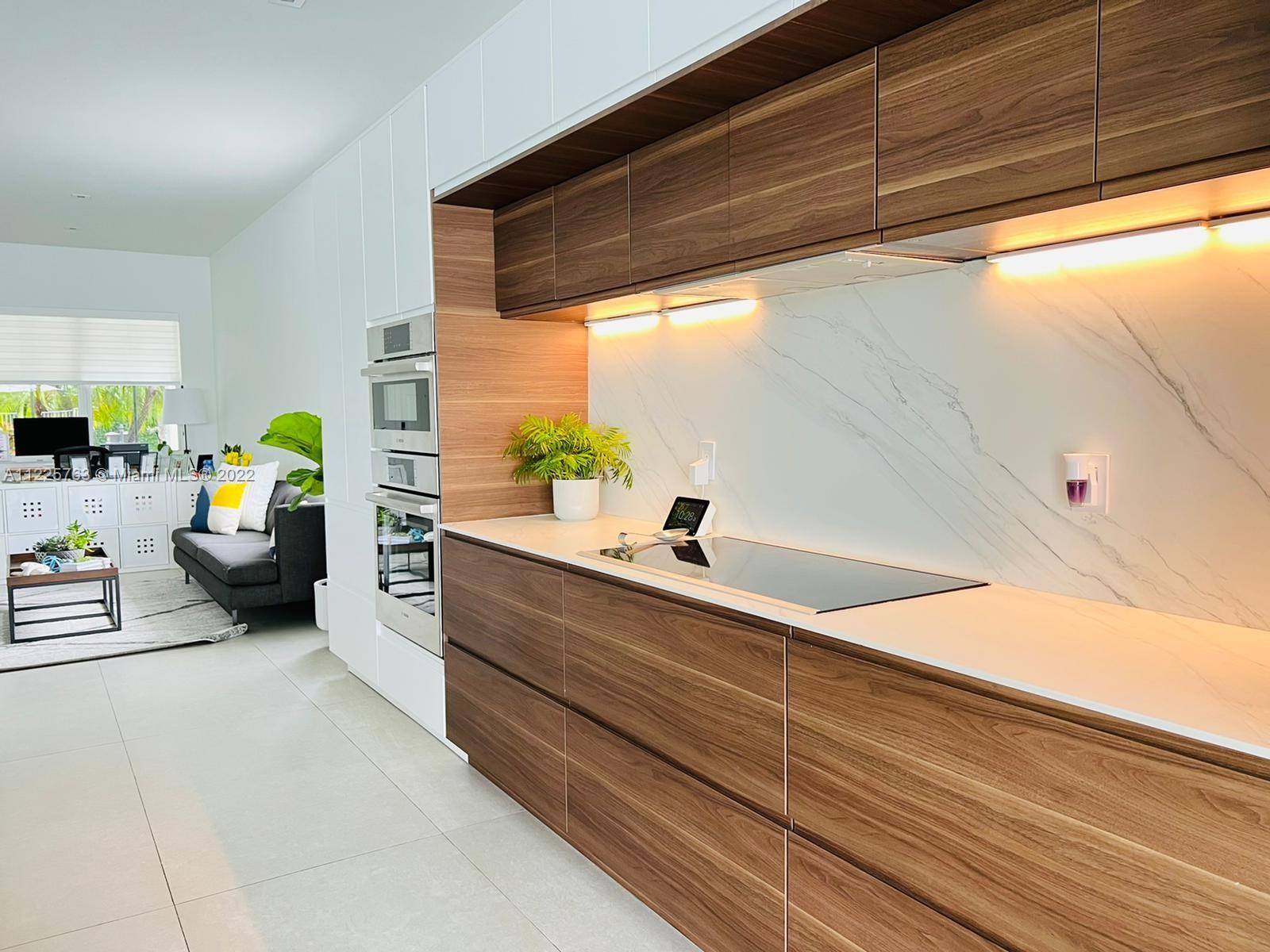 862 Tulip Circle Weston, FL 33327 - Photo 11 of 29 a living room with furniture and next to a window