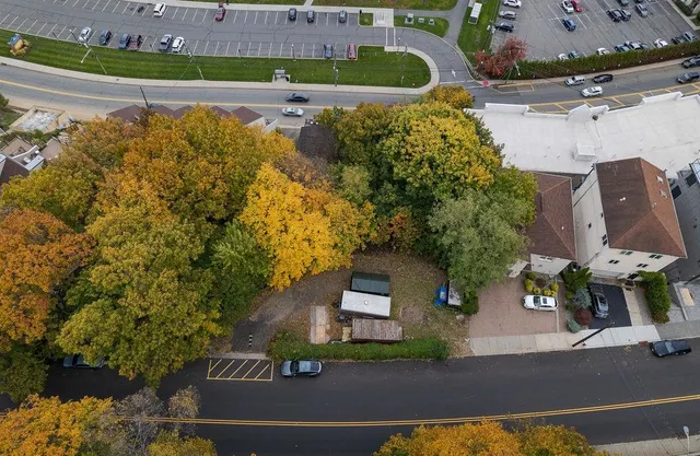 a front view of a building with street view