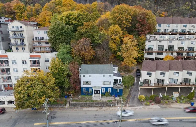 view of a house with a yard