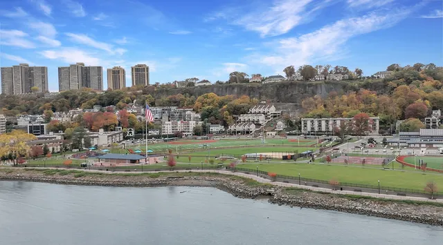 a aerial view of a building with a garden and plants