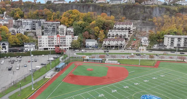 a view of swimming pool with outdoor seating and yard