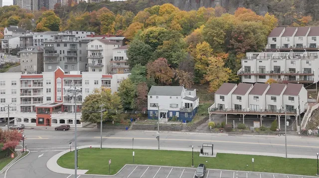 a view of swimming pool with outdoor seating and yard
