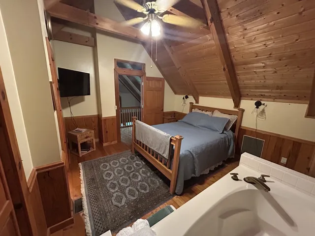 a bathroom with a sink and vanity