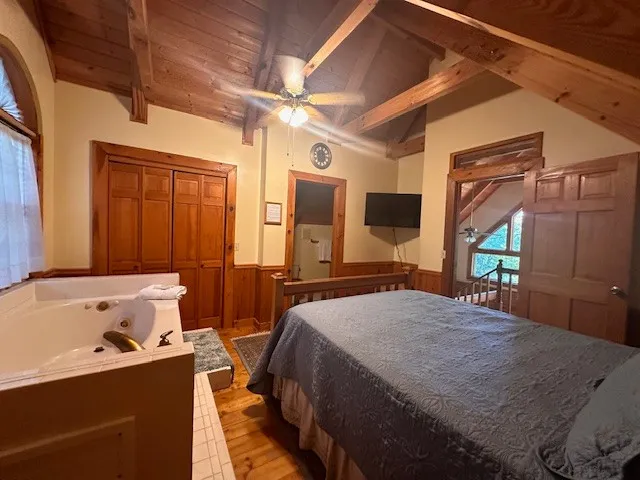 a view of balcony with wooden floor