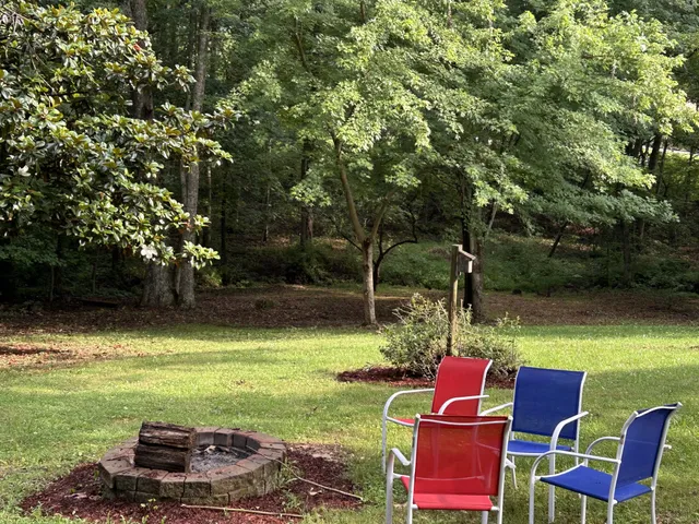 a garden view with a seating space