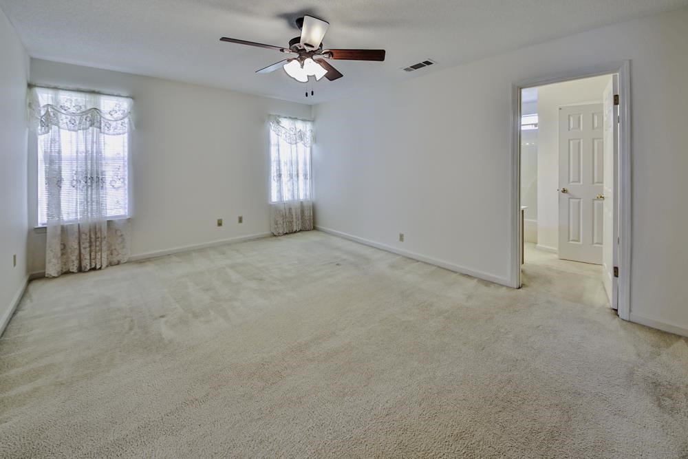 7448 Gingerhill Lane Bartlett, TN 38133 - Photo 18 of 39 a view of an empty room with a window
