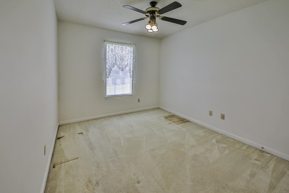 7448 Gingerhill Lane Bartlett, TN 38133 - Photo 27 of 39 an empty room with a window