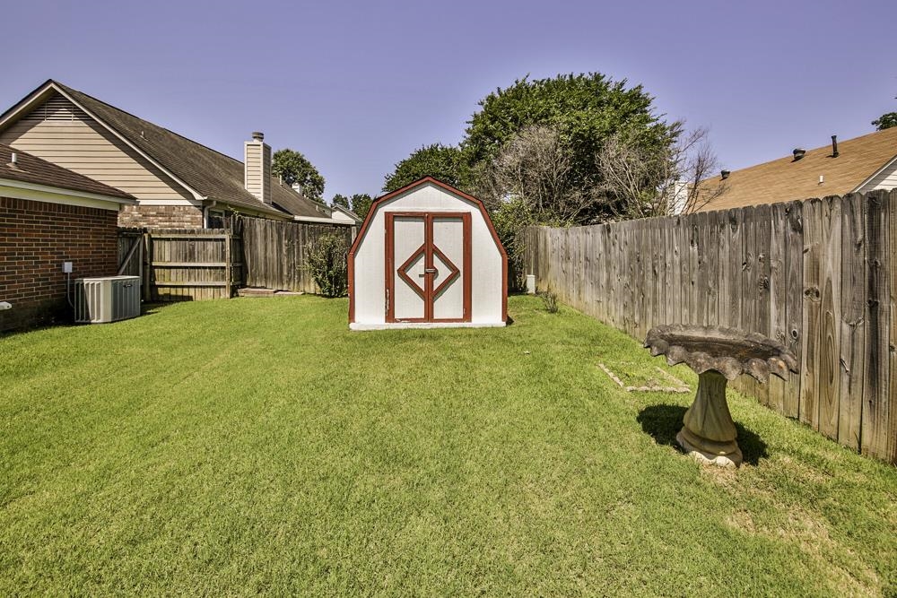 7448 Gingerhill Lane Bartlett, TN 38133 - Photo 33 of 39 a view of swimming pool with a yard