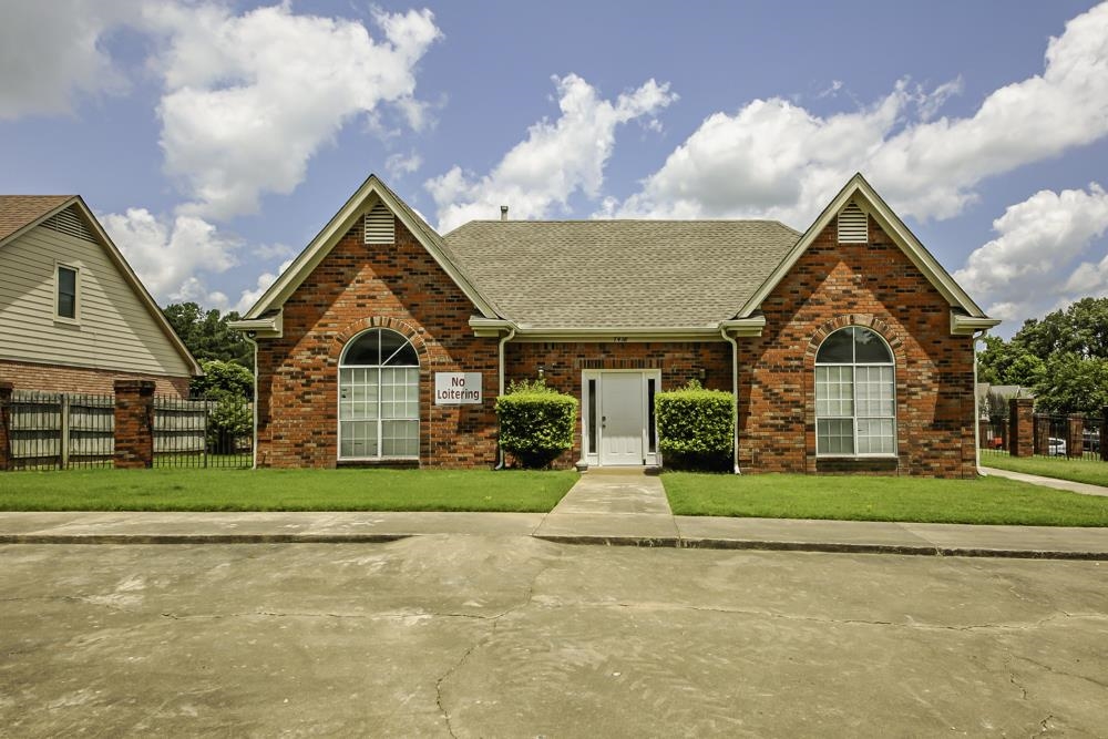 7448 Gingerhill Lane Bartlett, TN 38133 - Photo 37 of 39 a front view of house with yard and green space
