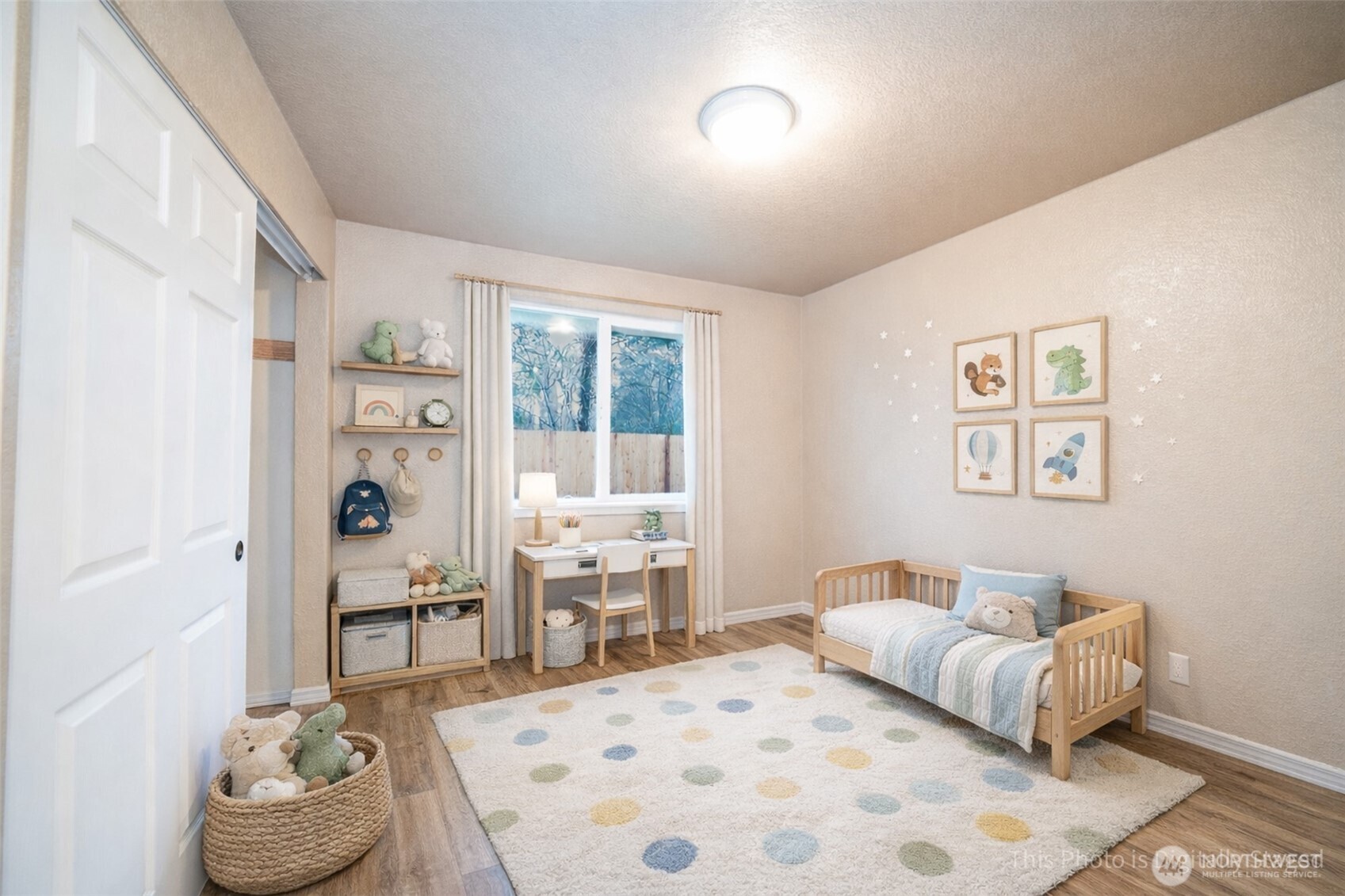 809 Cardigan Street Northwest Olympia, WA 98502 - Photo 17 of 30 a bedroom with a bed and a couch