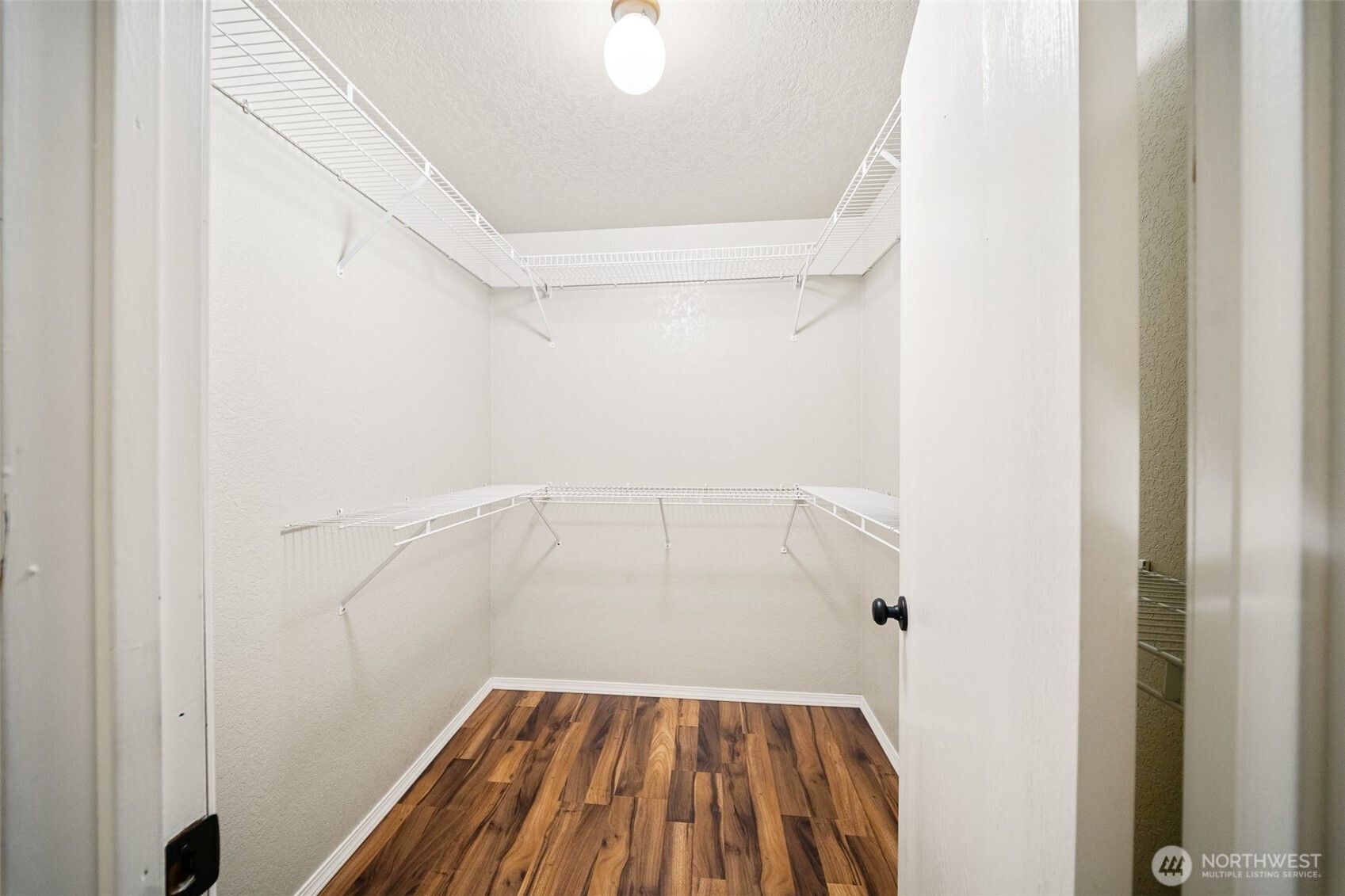 809 Cardigan Street Northwest Olympia, WA 98502 - Photo 23 of 30 a view of wooden floor in an empty room