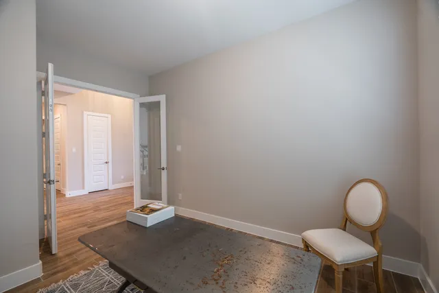 a workspace room with furniture