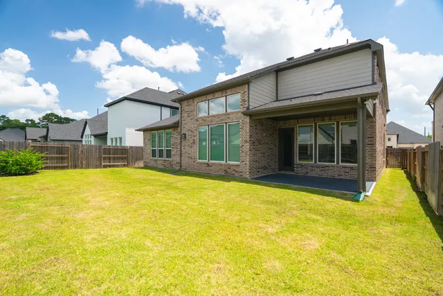 a view of a house with swimming pool