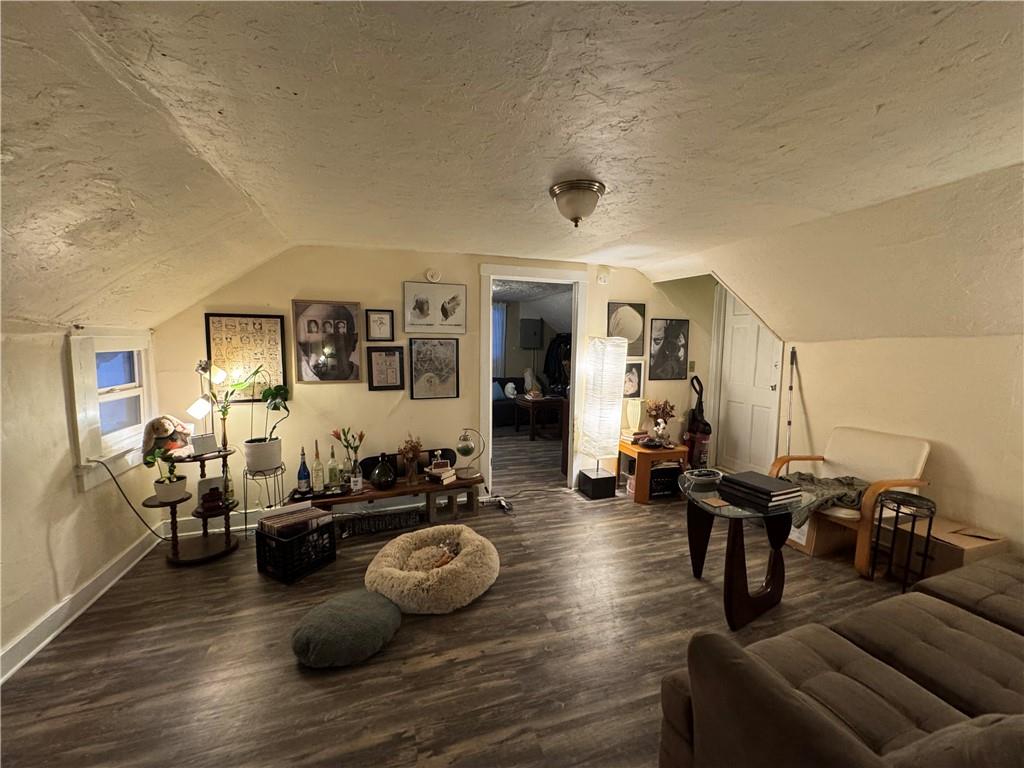 238-242 Philadelphia Street Indiana, PA 15701 - Photo 18 of 25 a living room with furniture and wooden floor